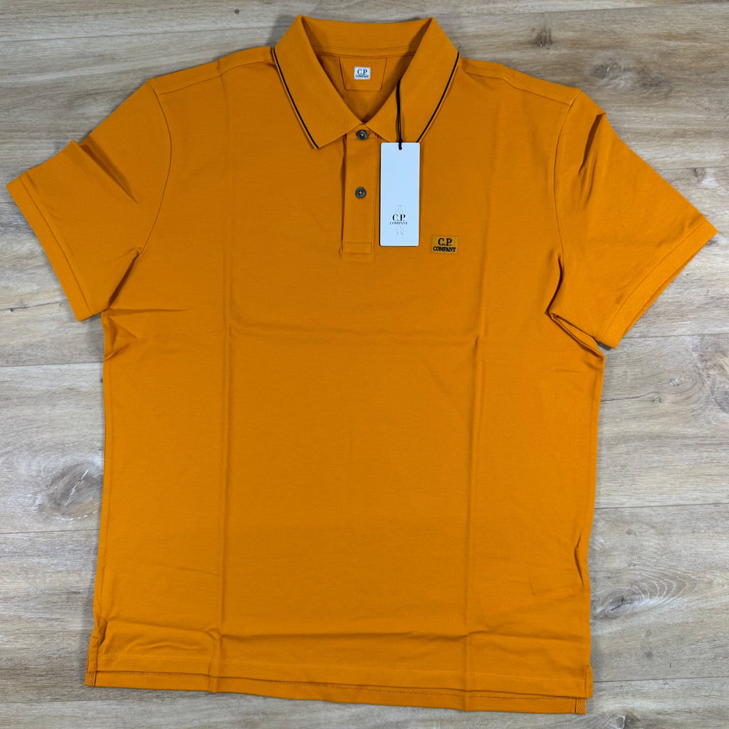 C.P. Company Stretch Piquet Striped Collar Polo Shirt in Desert Sun