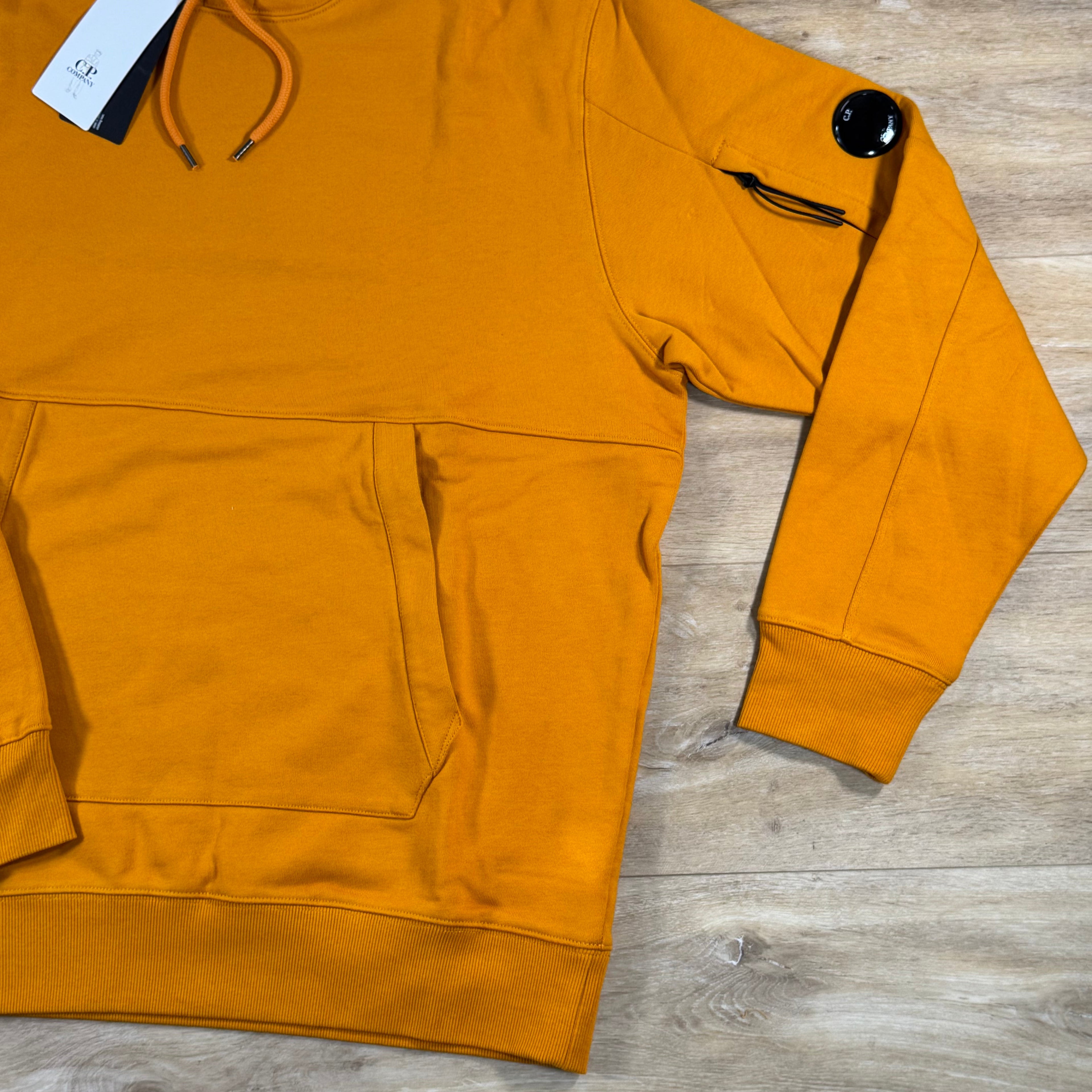 C.P. Company Diagonal Raised Fleece Lens Hoodie in Desert Sun
